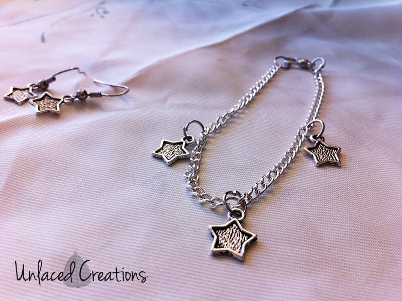 estelle. a silver star earring and bracelet set.