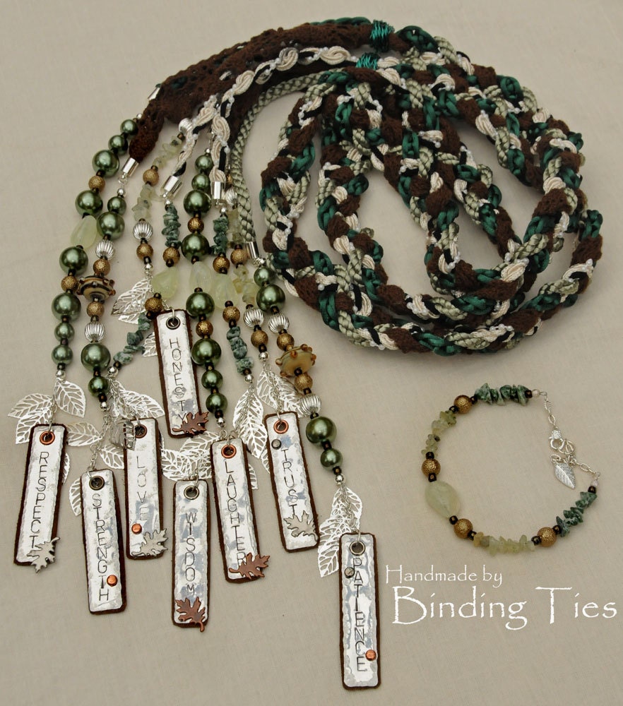 Handfasting cord in green, brown and cream with stamped aluminium, leather, glass pearls, silver leaves and gemstones