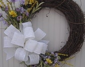 Spring Wildflower Wreath in Purple and Yellow with White Burlap Bow