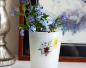 White floral milk glass.