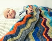 Crocheted chevron striped baby blanket orange blue