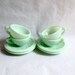Set of 4 small Art Deco jadeite tea cups and saucers