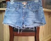 Upcycled, abercrombie and fitch, cutoff, light/medium wash, studded back pocket shorts.