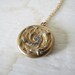 Antique Art Nouveau Era Locket With Embossed Flowers And Rhinestones c.1905