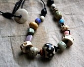 Message of the Ancients--a Necklace with Artisanal Stoneware Beads, Glass, and Bone Elements