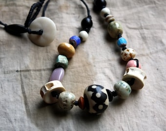 Message of the Ancients--a Necklace with Artisanal Stoneware Beads, Glass, and Bone Elements