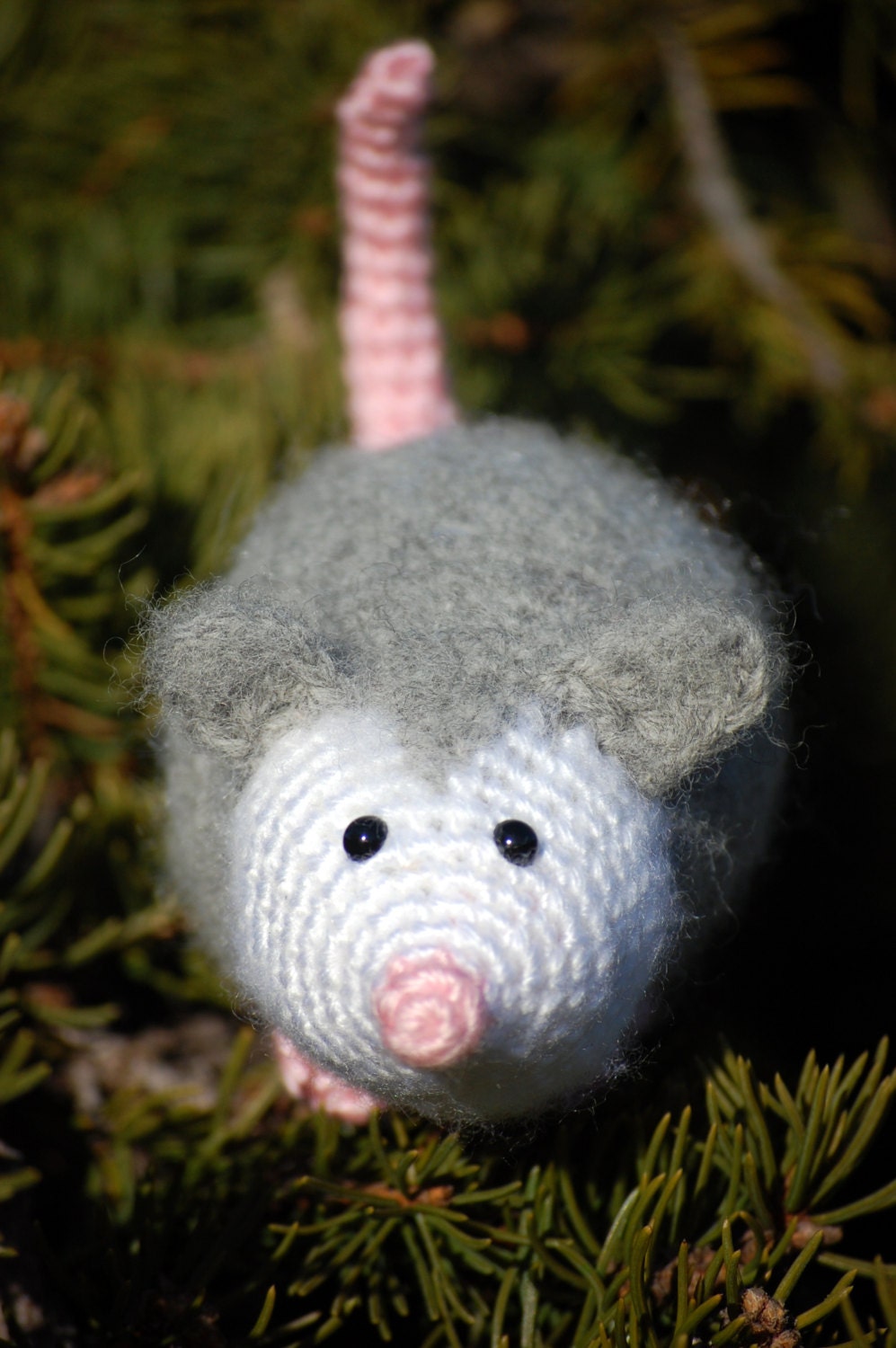 Olivia Opossum, a fluffy amigurumi plush toy