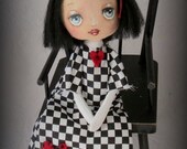 Cloth doll with black hair