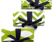 Three Bridesmaid clutches in apple green and navy blue pattern mix.  Custom colors available.