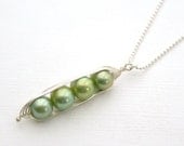 Peapod necklace. Four peas in a pod, green pearl pendant on sterling silver chain.