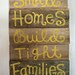 Pallet art-Small Homes build Tight Families