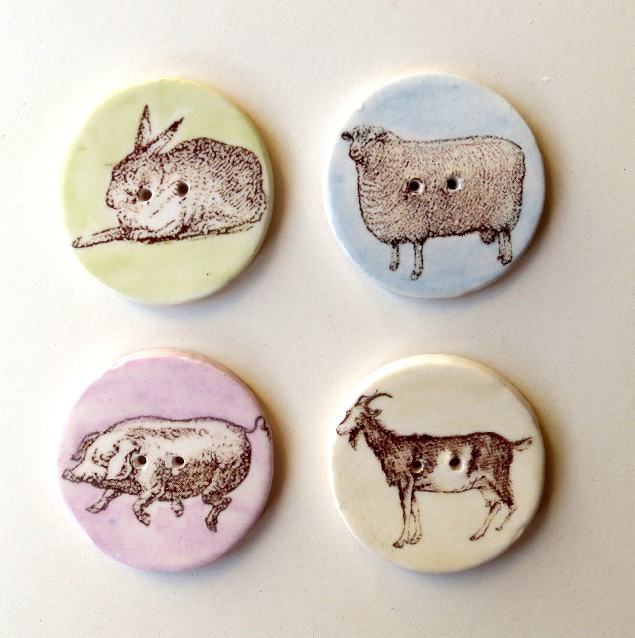 Handmade Farm Animal buttons, Pig, Goat, Rabbit, Sheep, Ceramic Clay, Lilac, Blue & Green. Set of 4