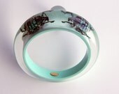 Summer blue lucite bracelet with real beetles
