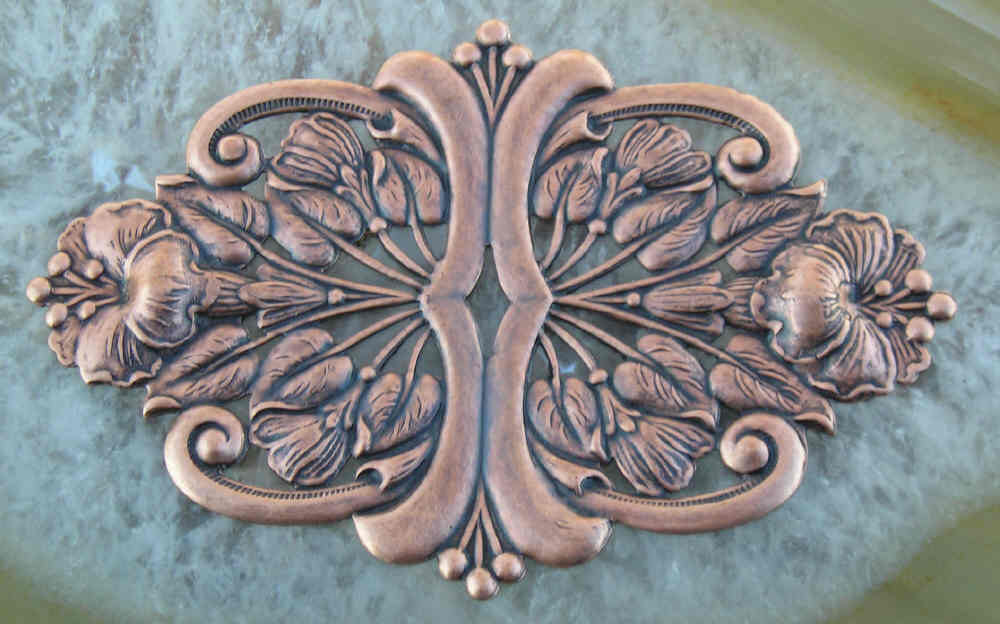 Copper patina floral stampings..big things suitable to build on.