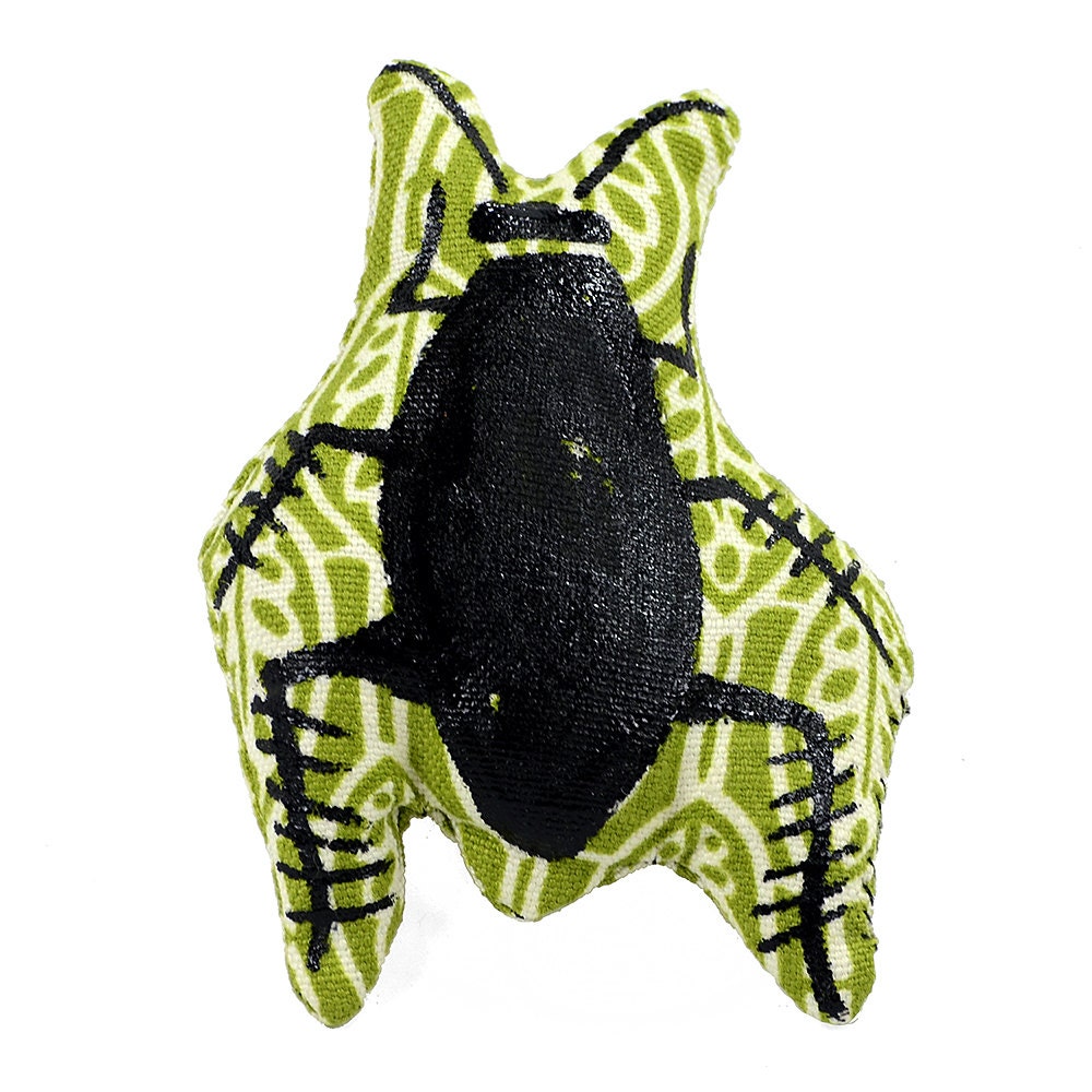 catnip cockroach drawn on green & white fabric