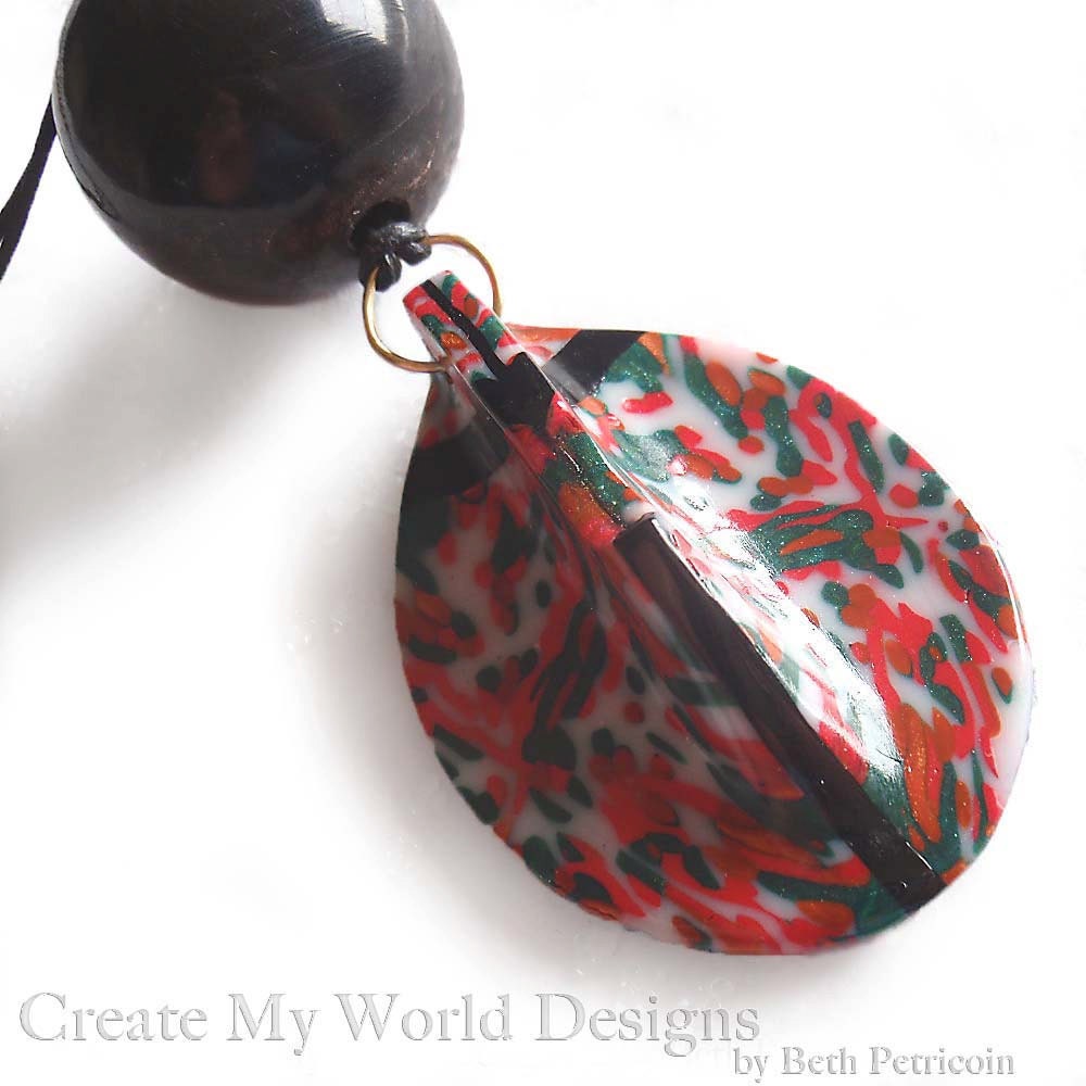 Tribal Pendant Necklace: Polymer Clay, upcycled horn bead, black, red, green, copper, white