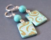 Aqua gold swirls. Polymer clay and turquoise dangle earrings. Leverback earrings. Teal color.