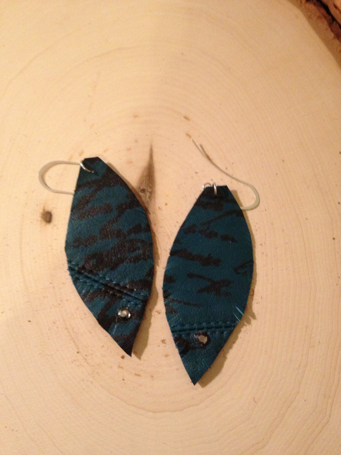 Teal feather Leather earrings