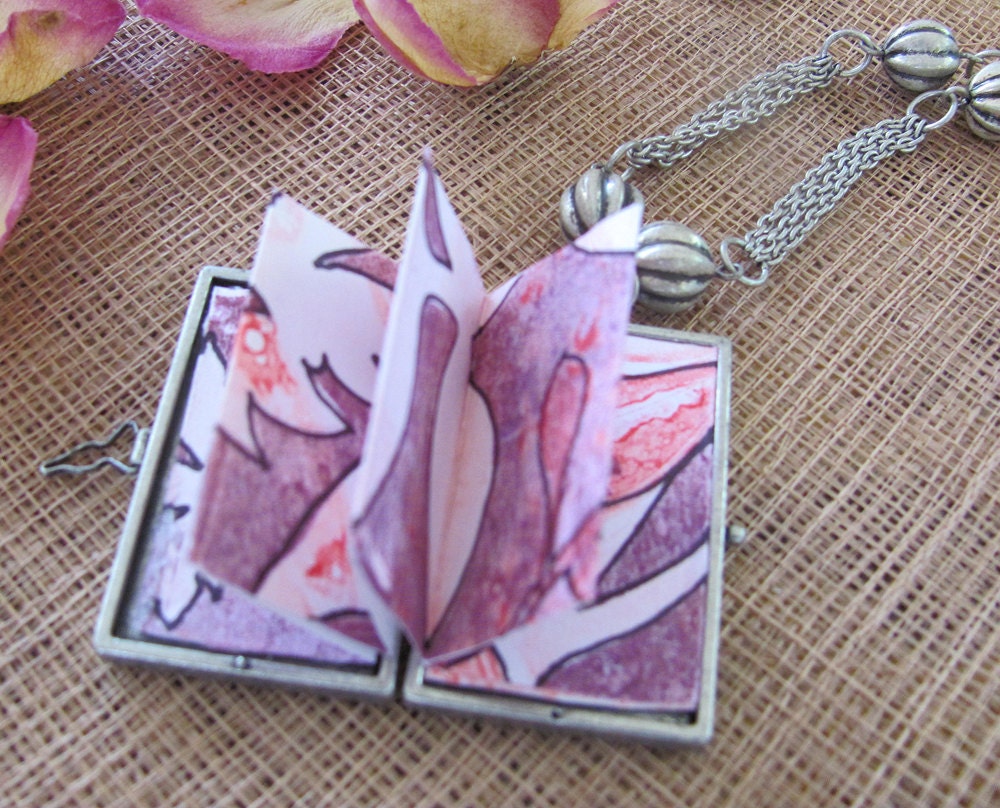 unique locket necklace with small book
