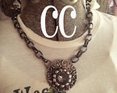 Molten Stamped Metal Gray Stone Necklace