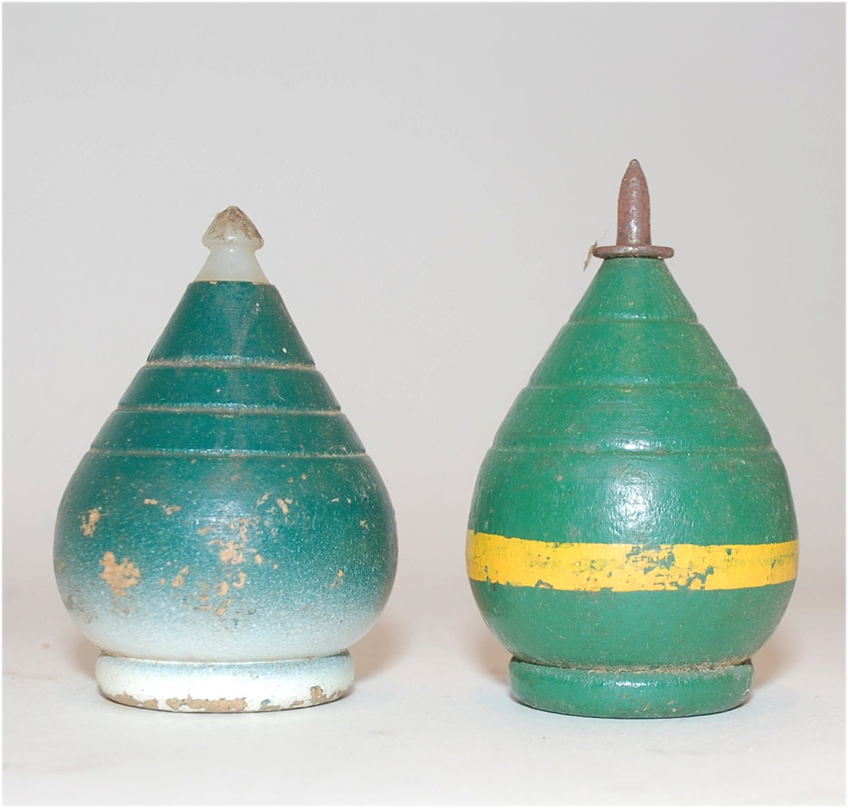 two green spinning toy tops wood vintage Duncan Tornado