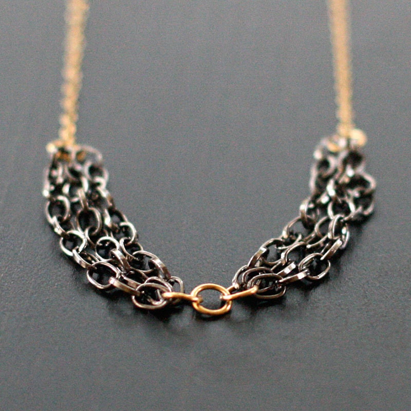 banquet - gold and gunmetal necklace by elephantine