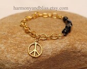 Black and Gold peace sign charm bracelet
