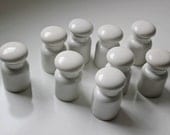 set of 9 porcelain spice jars not labeled