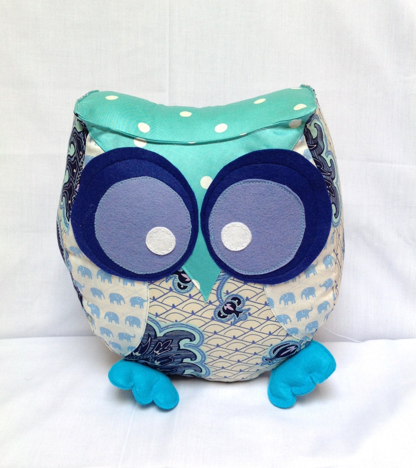 Chubby owl pillow in shades of navy and turquoise