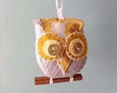 Small grey and gold owl ornament