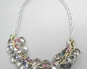 Button encrusted silver & gold charm necklace
