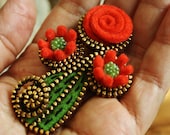 Orange felt and zipper  flower brooch