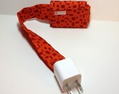 PowerTube.  Charging cord organizer for iPhone or iPod.  Cord keeper.  Cord organizer.  Power cord case.