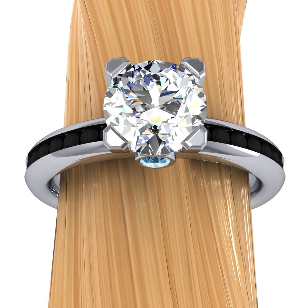 Diamond Solitaire Engagement Ring in Platinum, 1.1 Carat, Black Diamond Channel Band and Blue Diamond Accent