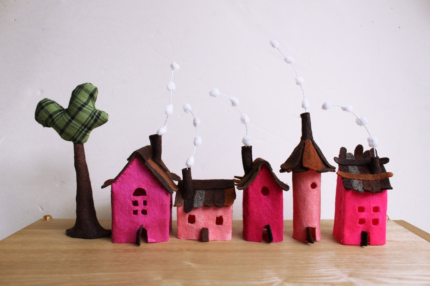 Miniature. Pink small Village, Five Felt houses with tree.