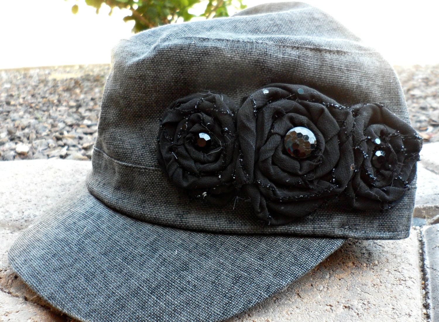 Simply Stated Wahed Grey Hat with Trio of Black Rolled Rosette Flowers