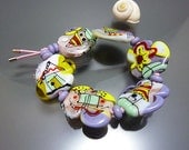 Melanie Moertel Lampwork Beads - Glass bracelet with handmade lampwork beads - "Where the read and yellow houses are"
