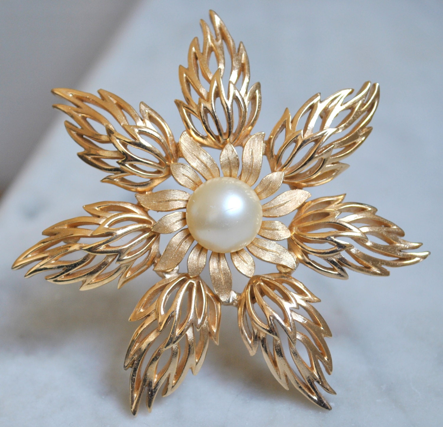 Crown Trifari Large Gold Flower Brooch with Pearl Center