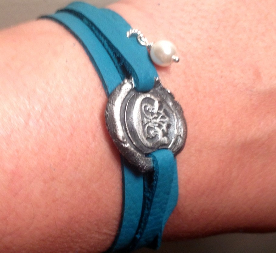 Leather and fine silver