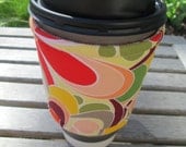Handmade Cup or Coffee Cozy or Sleeve in Orange, Green, and Yellow Floral with Cream and Orange Seedpods
