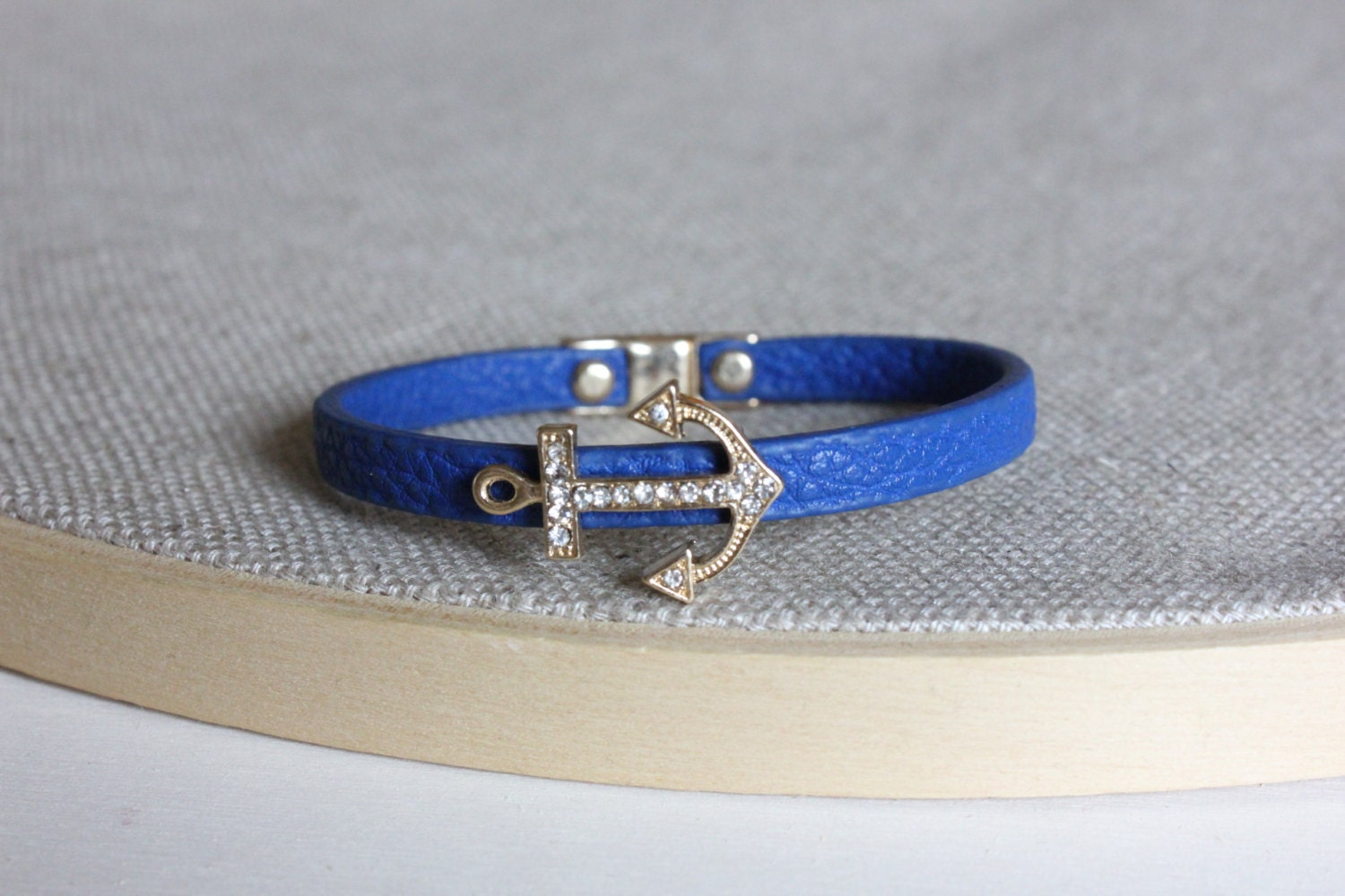Sweet blue bracelet with a gold charm