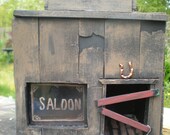 The ghost town saloon. Your name gets painted on top of the bar. With lights