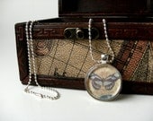 Glass pendant necklace - antique butterfly