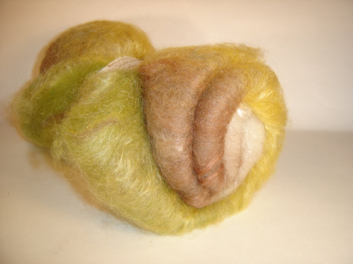 Batt , Roving, Spinning batt,   Swamp Thing 2  oz  Llama,  wool,  Fire star, and bamboo in  yellow, tan, and olive green