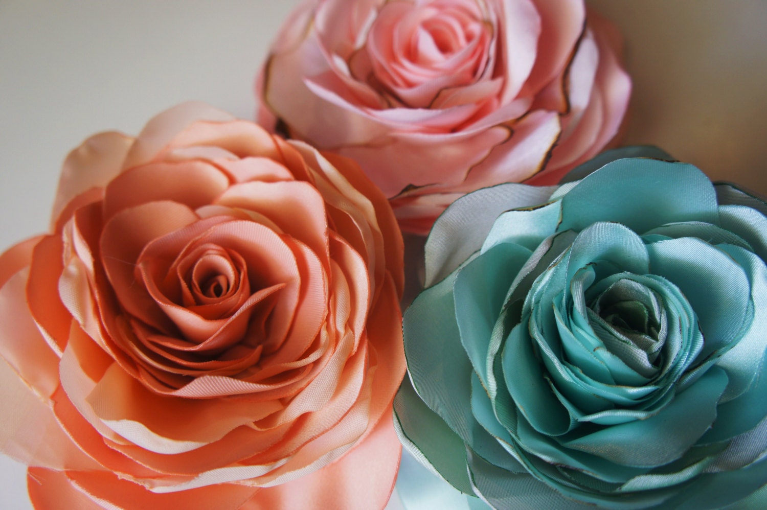 Pastel pale pink, turquoise and peach recycled silk and satin hair flowers