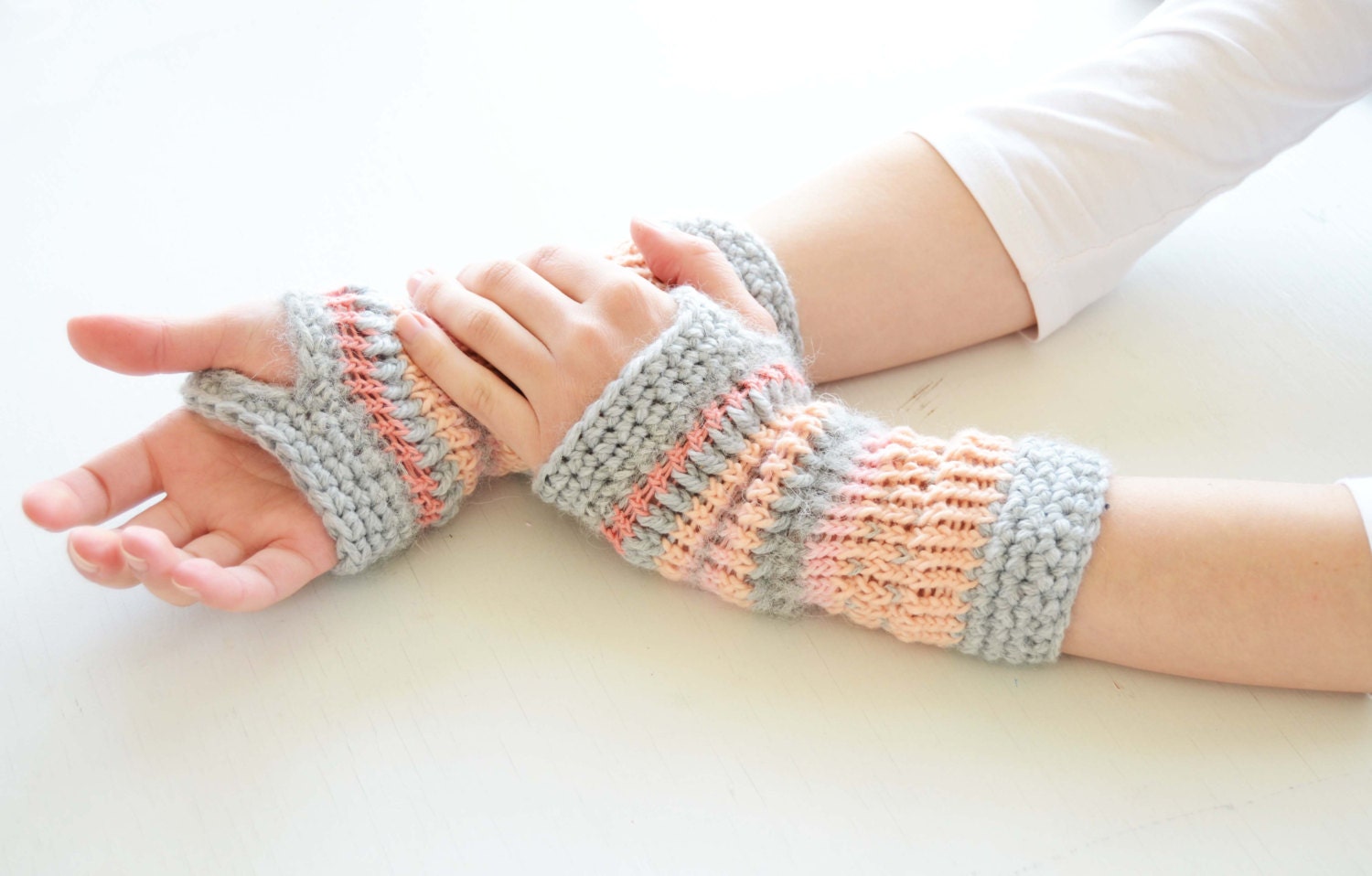 Pastel knitted wrist warmers - patterned fingerless gloves in powder pink and gray