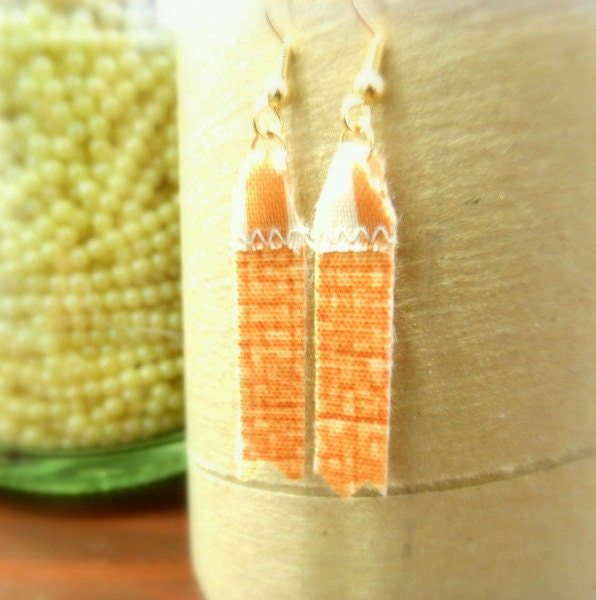 Mini fringe earrings handmade from recycled designer fabric books in Atlanta. orange.