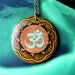 large hand painted laser etched OM pendant