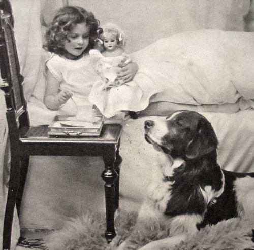 Antique girl photo postcard, with dog and doll, 1900s
