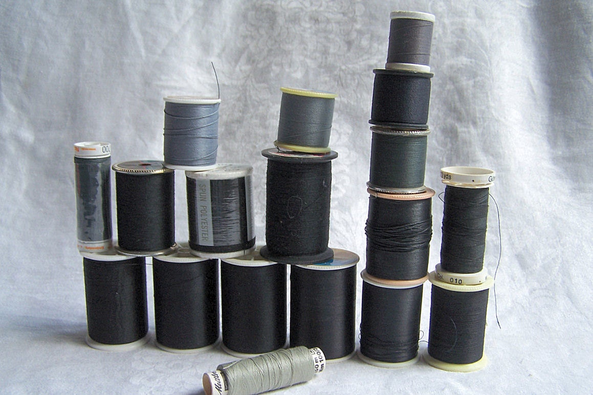 18 Spools of Thread - black and various shades of grey